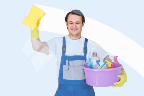 Office cleaner working in a Haringey workplace reception area