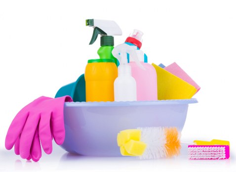Technician assessing curtains for professional cleaning in Haringey