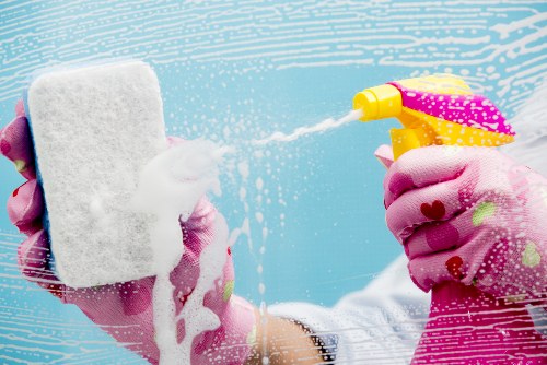 Local cleaning team finishing post-construction dust removal in Haringey