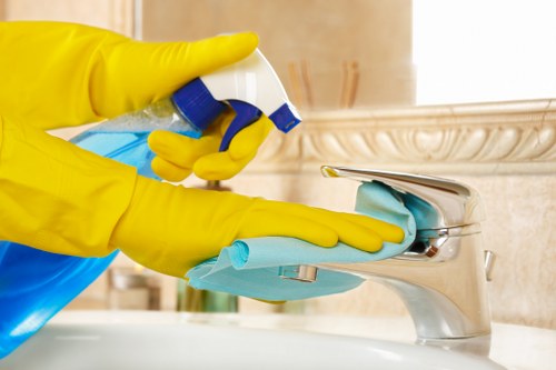 Upholstery cleaning equipment used on a sectional sofa